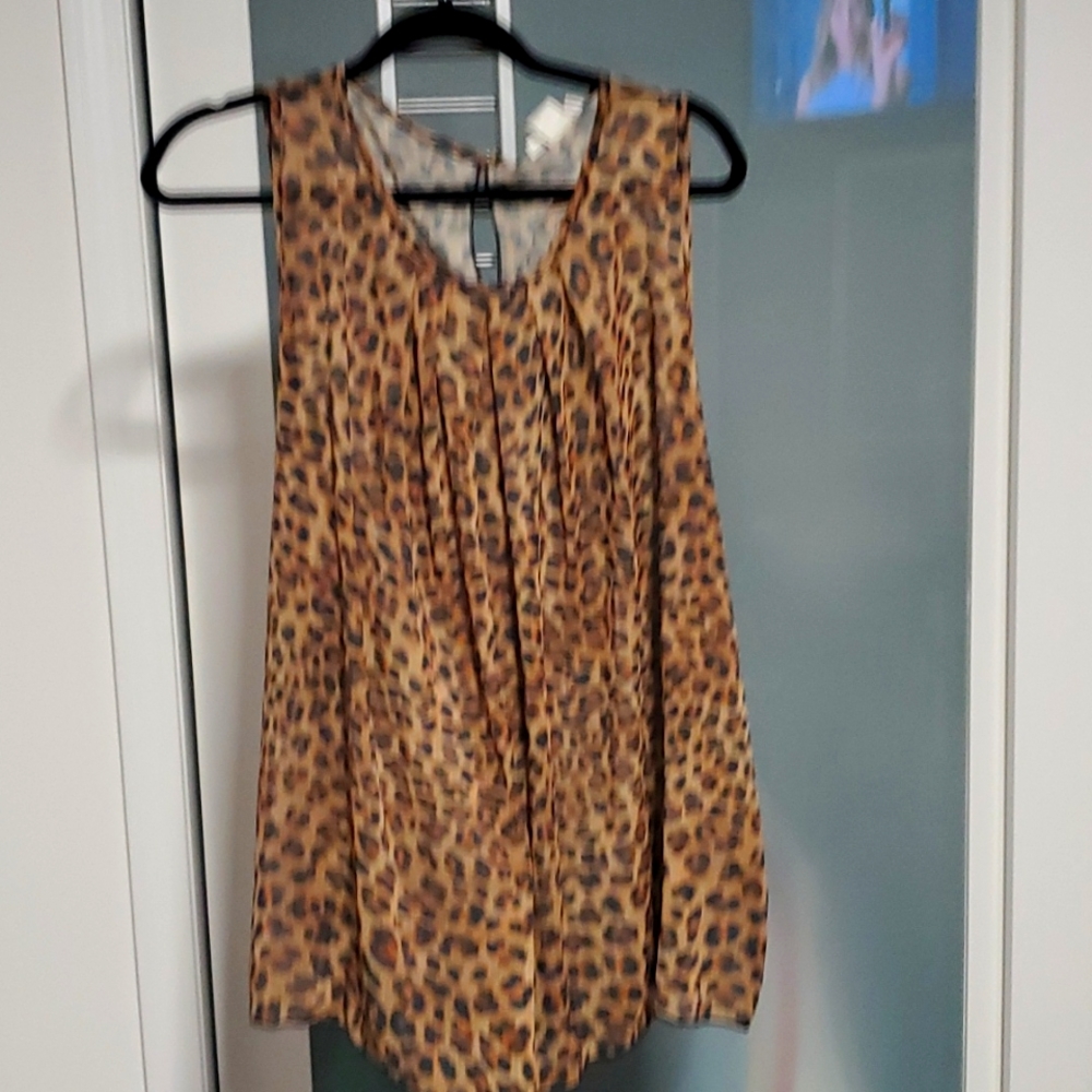 Sushi flower sleeveless tank top leopard print size 2x will fit xl as well.